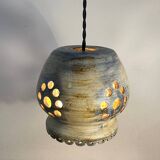Ceramic suspension with openings