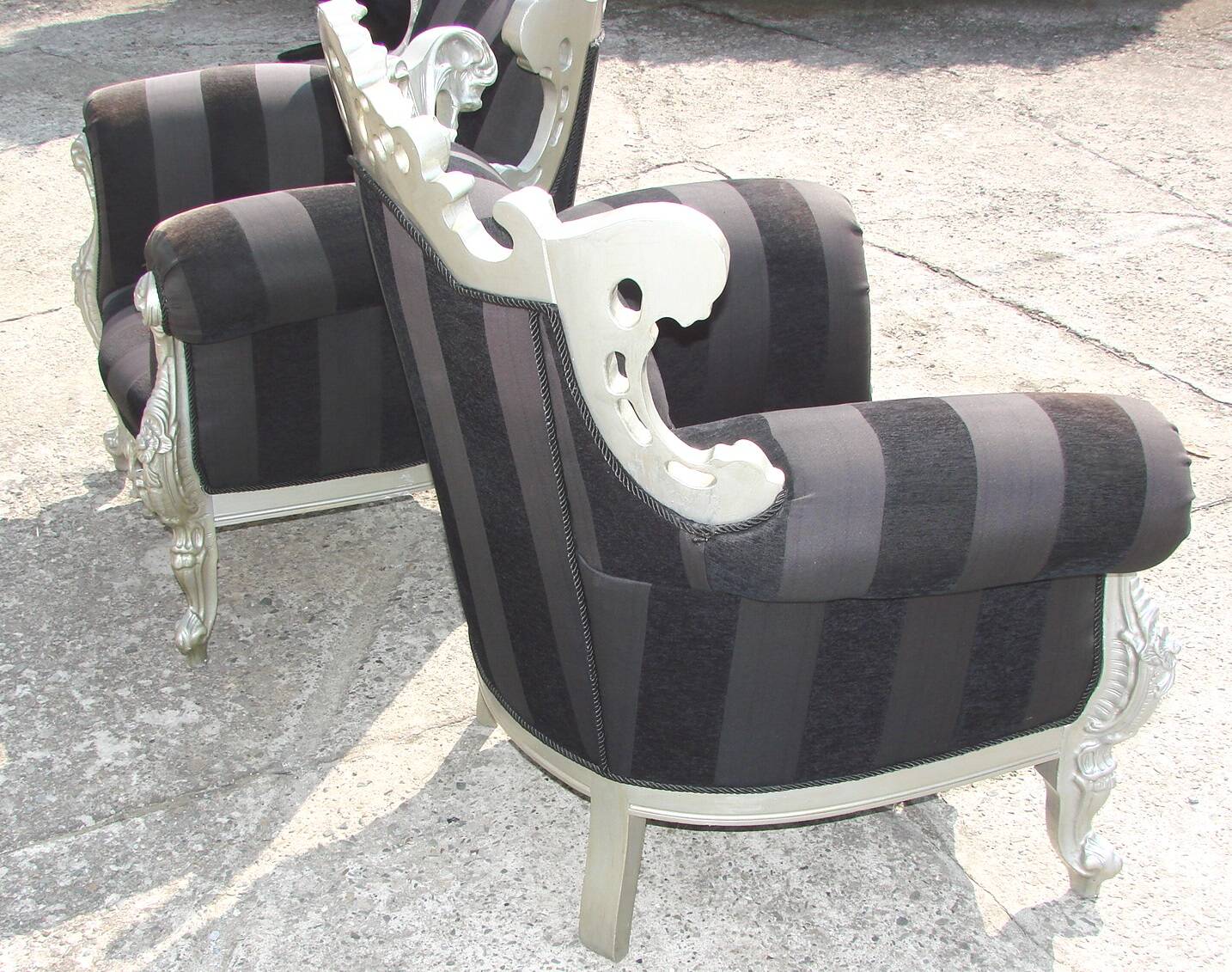 A pair of vintage armchairs, 1980s, lacquered wood and fabric
