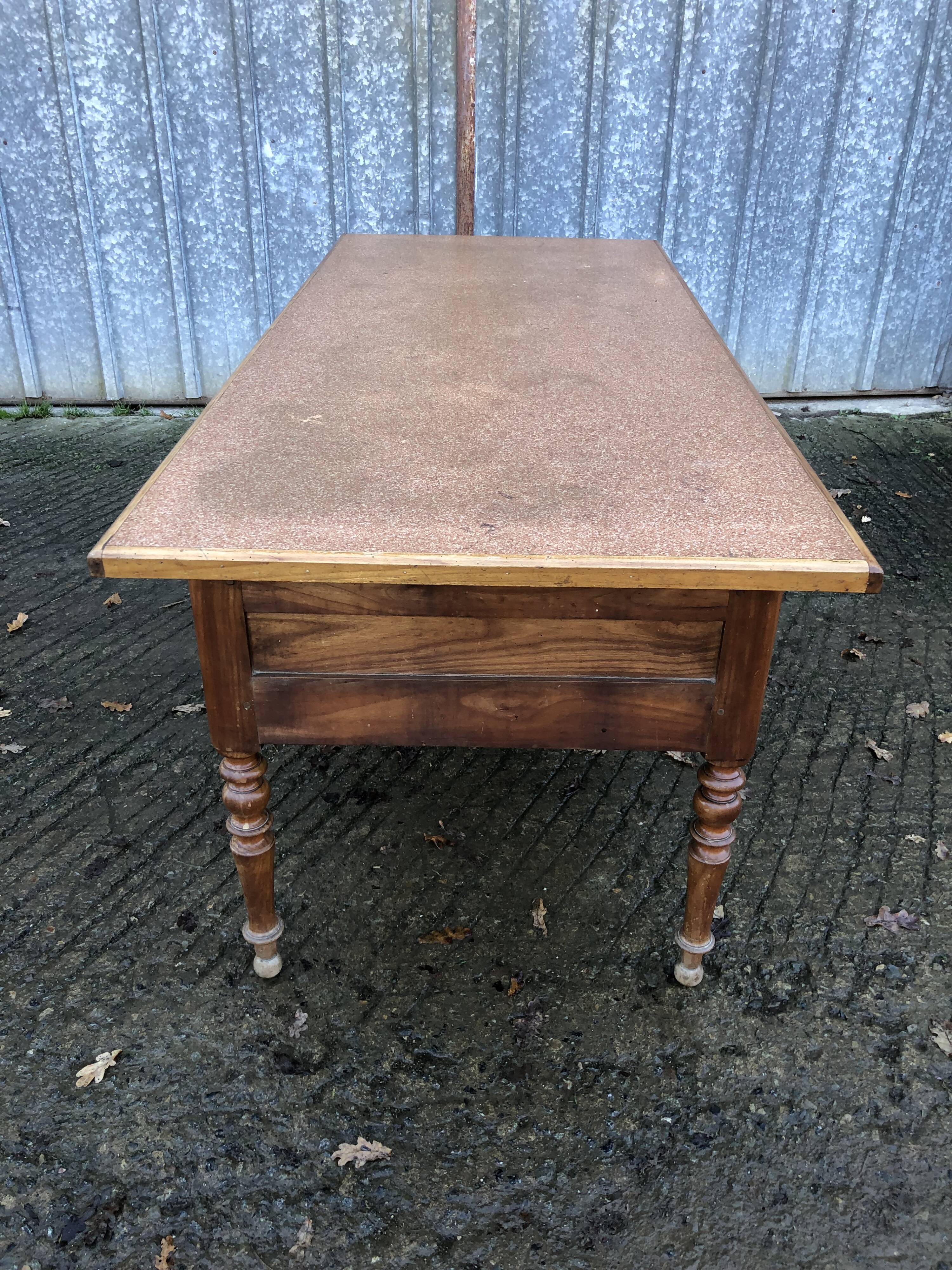 Solid cherry game table with 2 front drawers and panelled crosspieces.