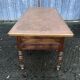 Solid cherry game table with 2 front drawers and panelled crosspieces.