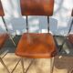 3 chaises vintage en inox et simili-cuir marron