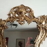Antique mirror in gilded metal