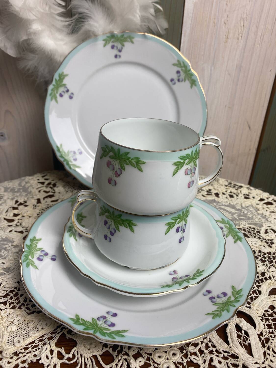 Set of 2 antique porcelain chocolate services.