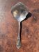 Strawberry spoon or antique Art Nouveau fruit salad in silver metal.