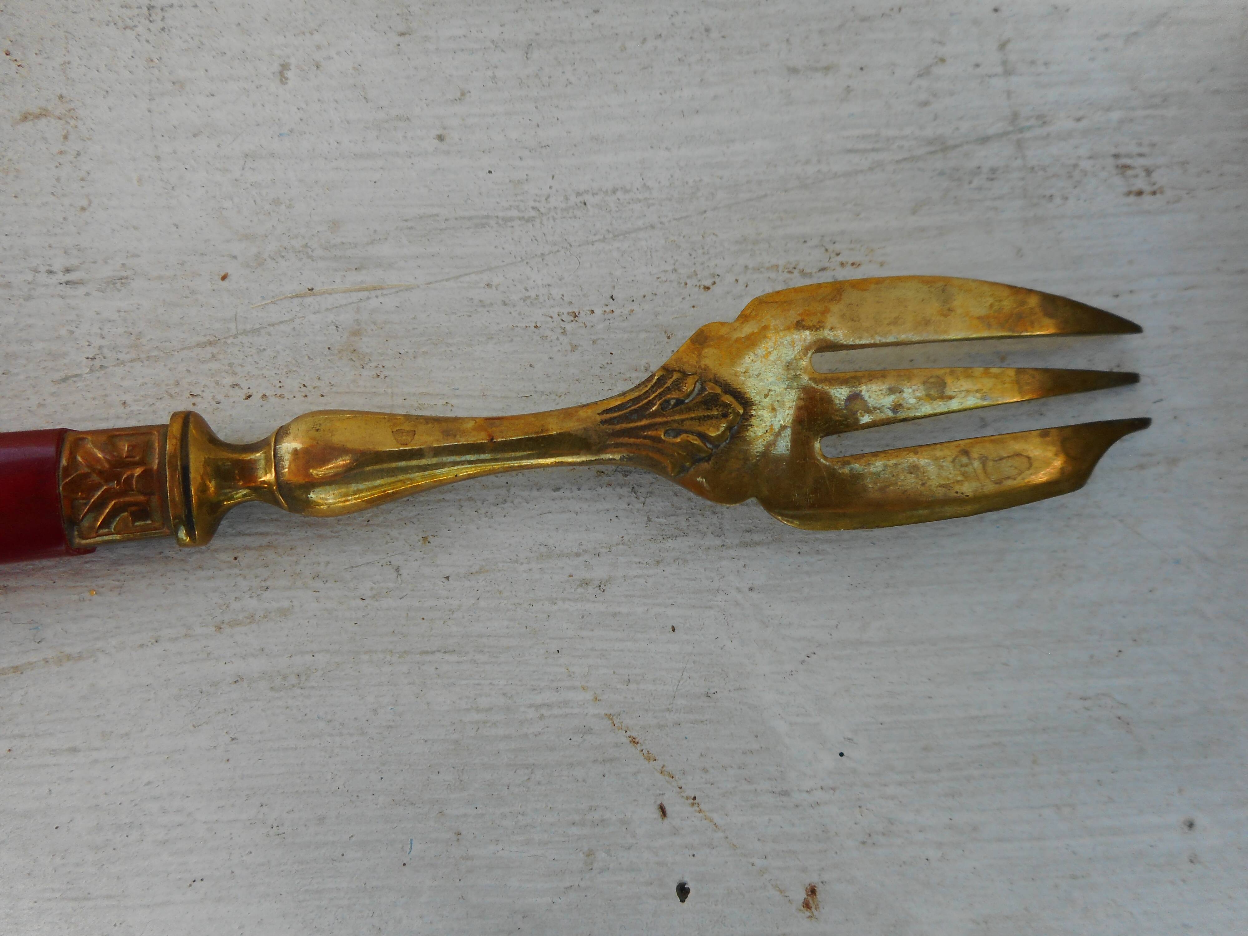 Twelve bakelite handle cake forks