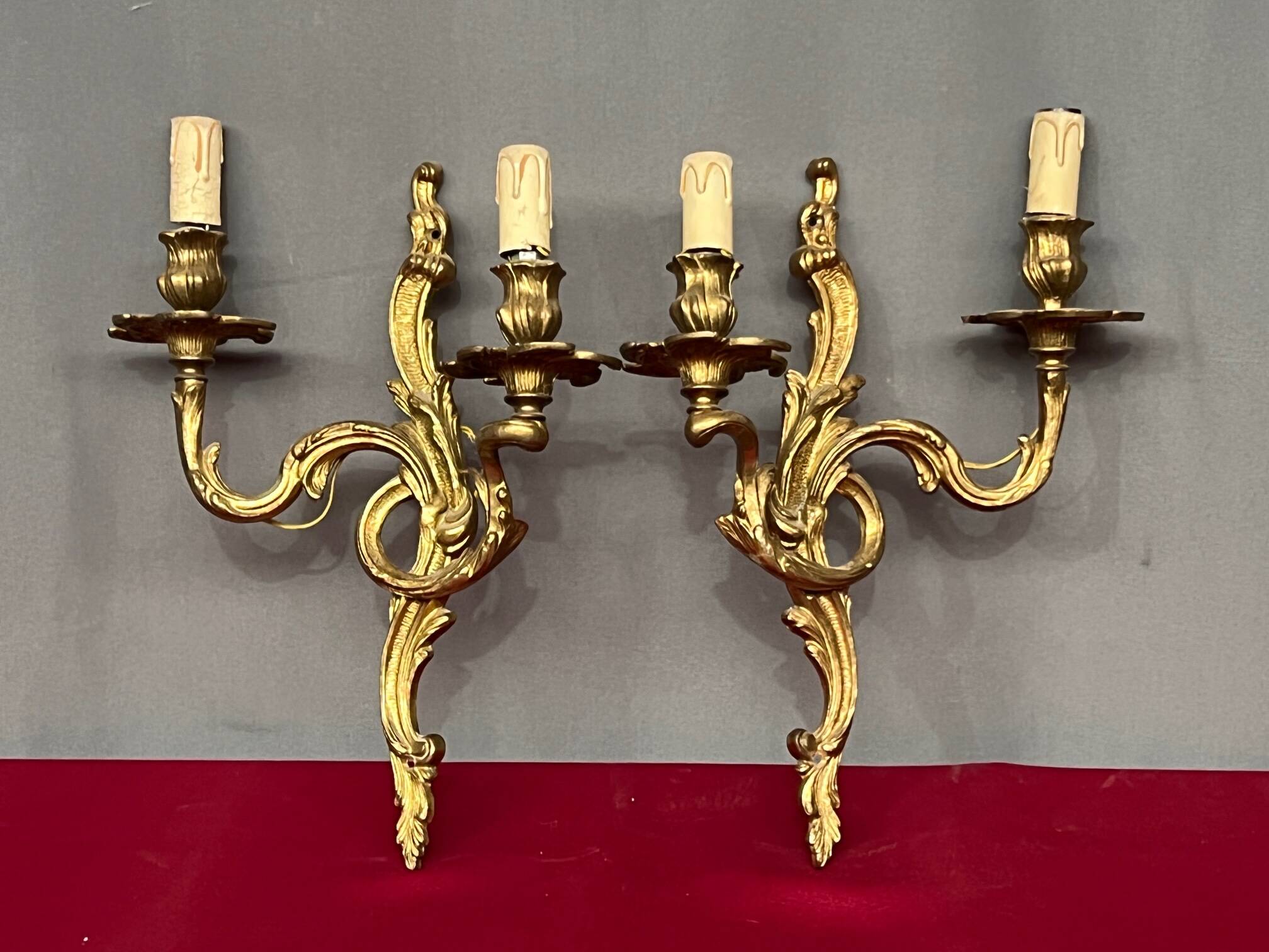 Pair of Rococo gilded solid bronze wall lights.