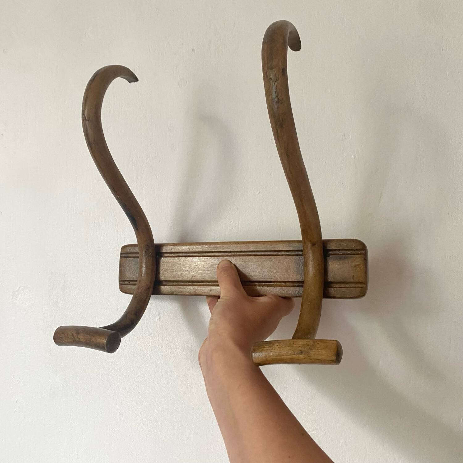 Curved wooden coat rack from the early 20th century