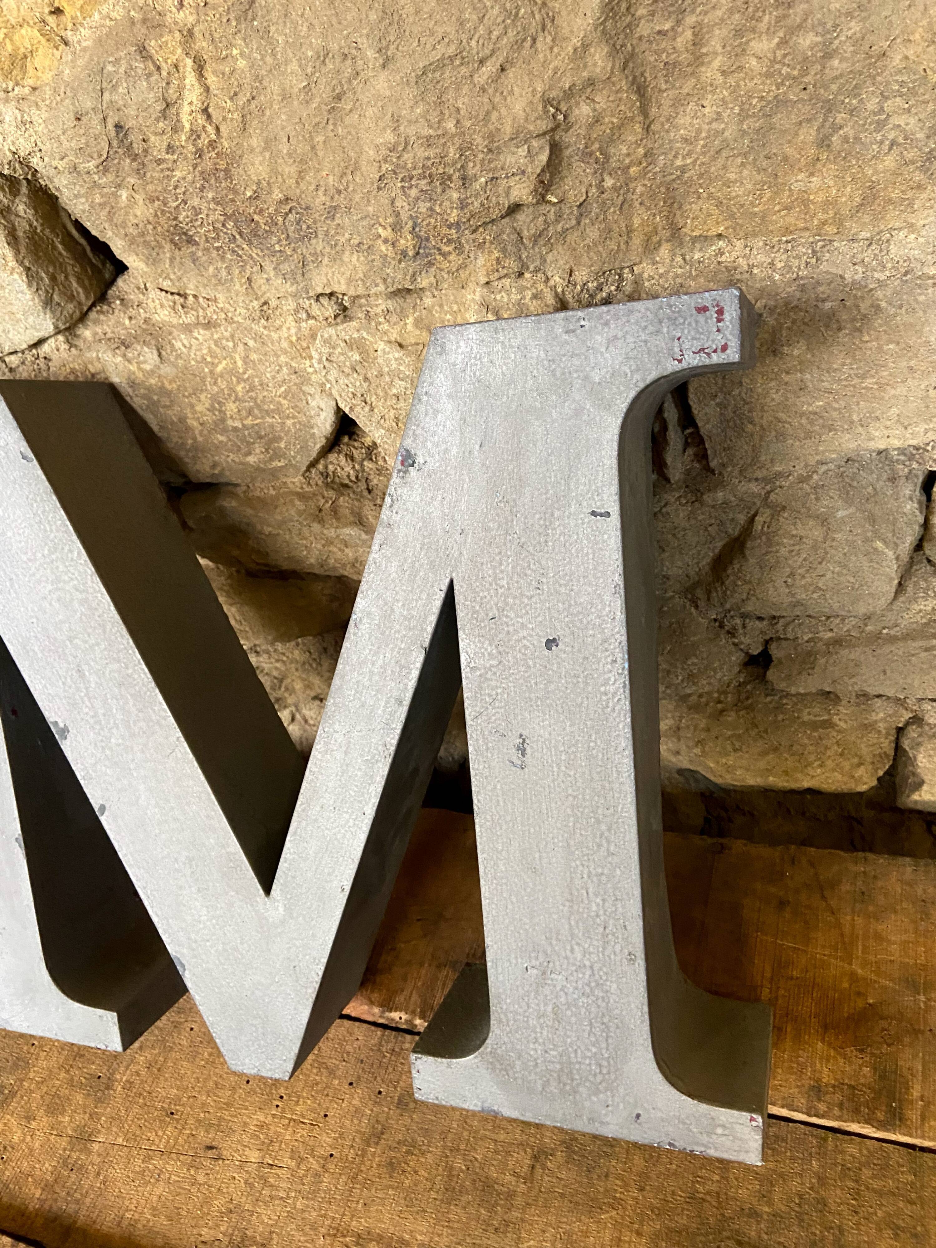 Letter metal - m