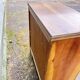 Small English chest of drawers with a folding top.