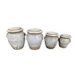 Suite of antique enamelled ceramic pots