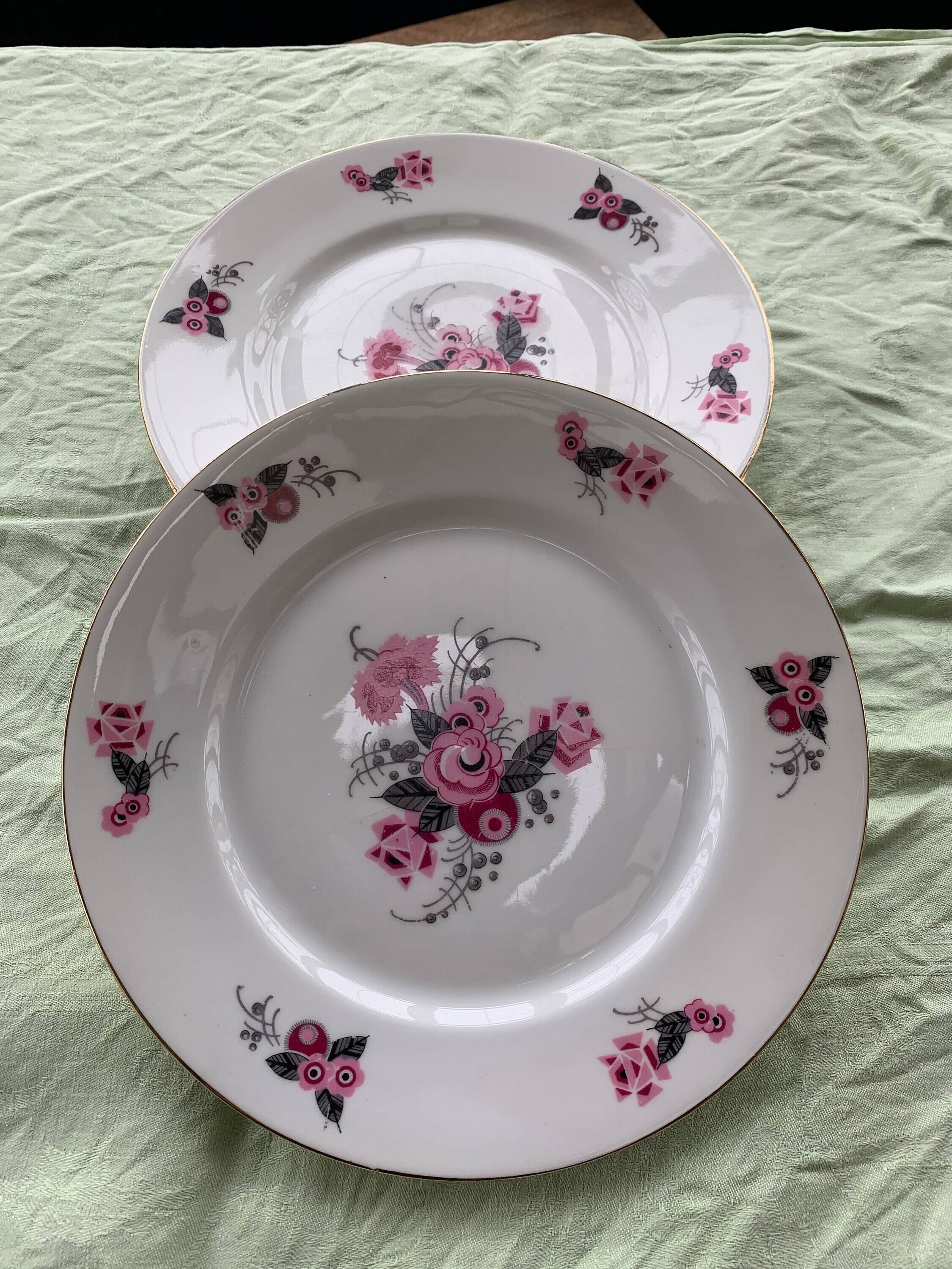 Set of 4 flat plates, in art deco porcelain