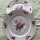 Set of 4 flat plates, in art deco porcelain