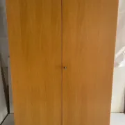 Vintage wardrobe with tapered legs