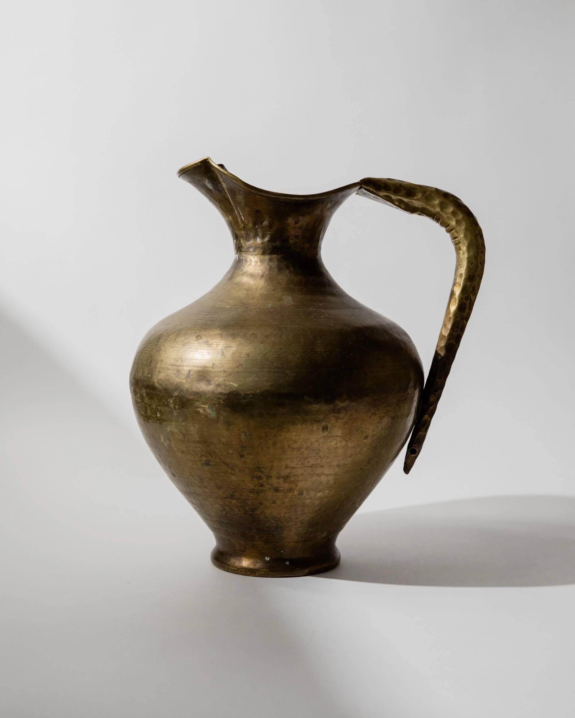 Vintage brass vase from the 1940s, hand-hammered metal, amphora shape, Italian design from the 1940s.