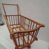 ancien landeau de poupée  sur roues en bois ,marque  Dejou