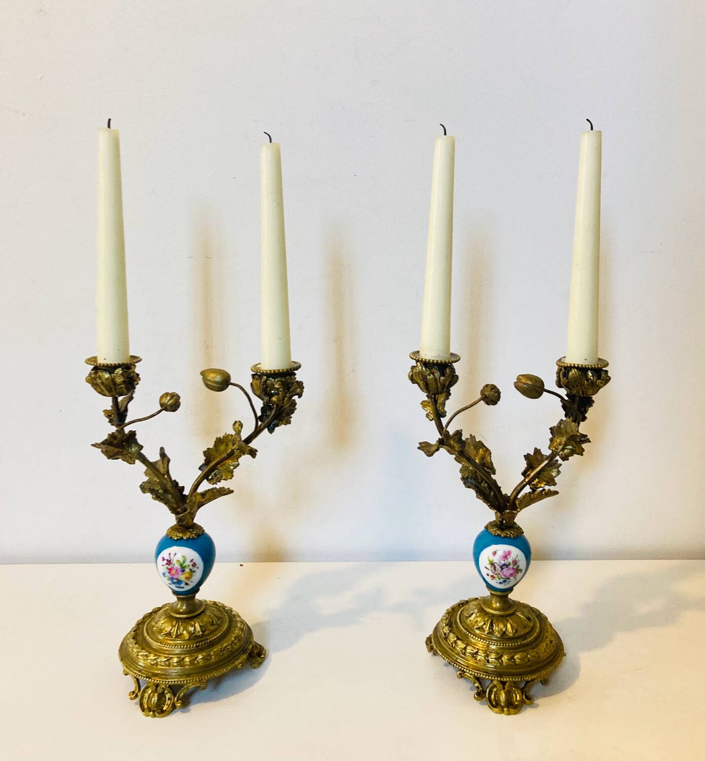 19th century candle holders in gilded bronze and porcelain