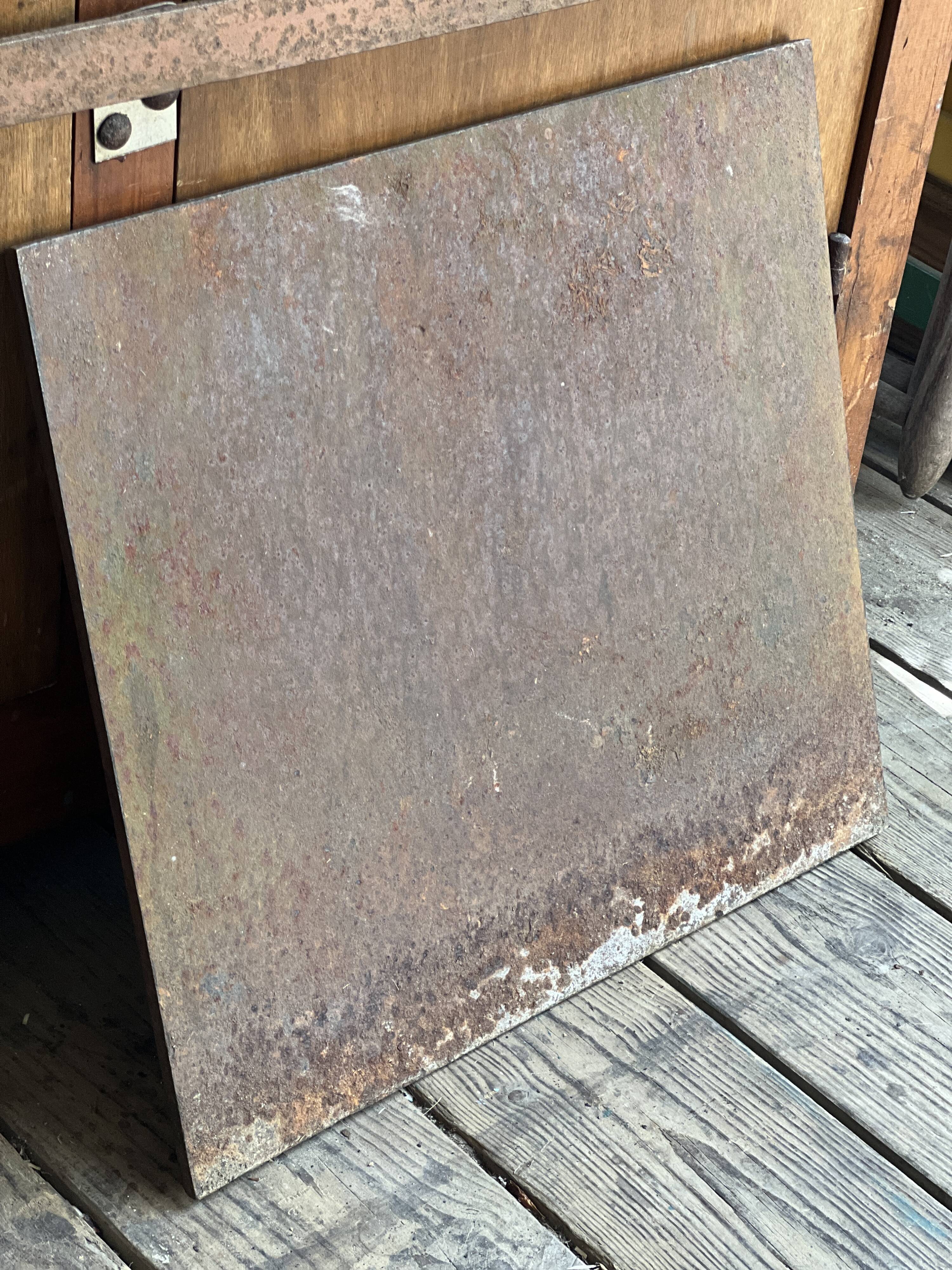 Cast iron plaque signed