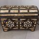 Handcrafted chest made of brass and camel bone.