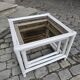 Nest of bamboo and smoked glass tables from the 1970s.