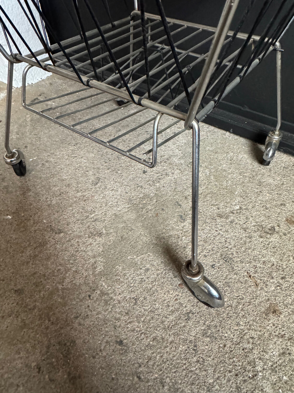 1950s rolling magazine rack