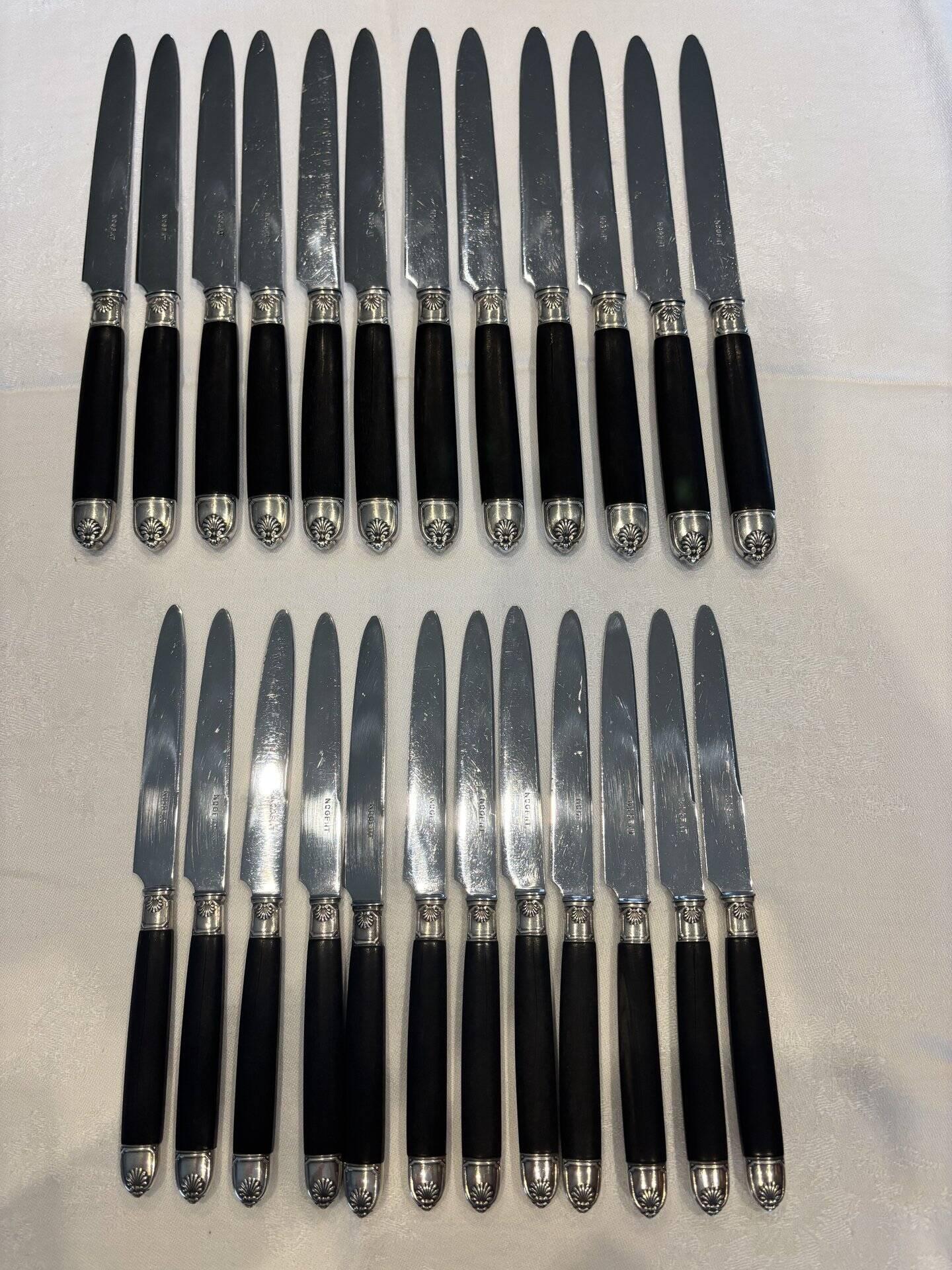 Empire-style knife set in ebony, with silver ferrules and pommels