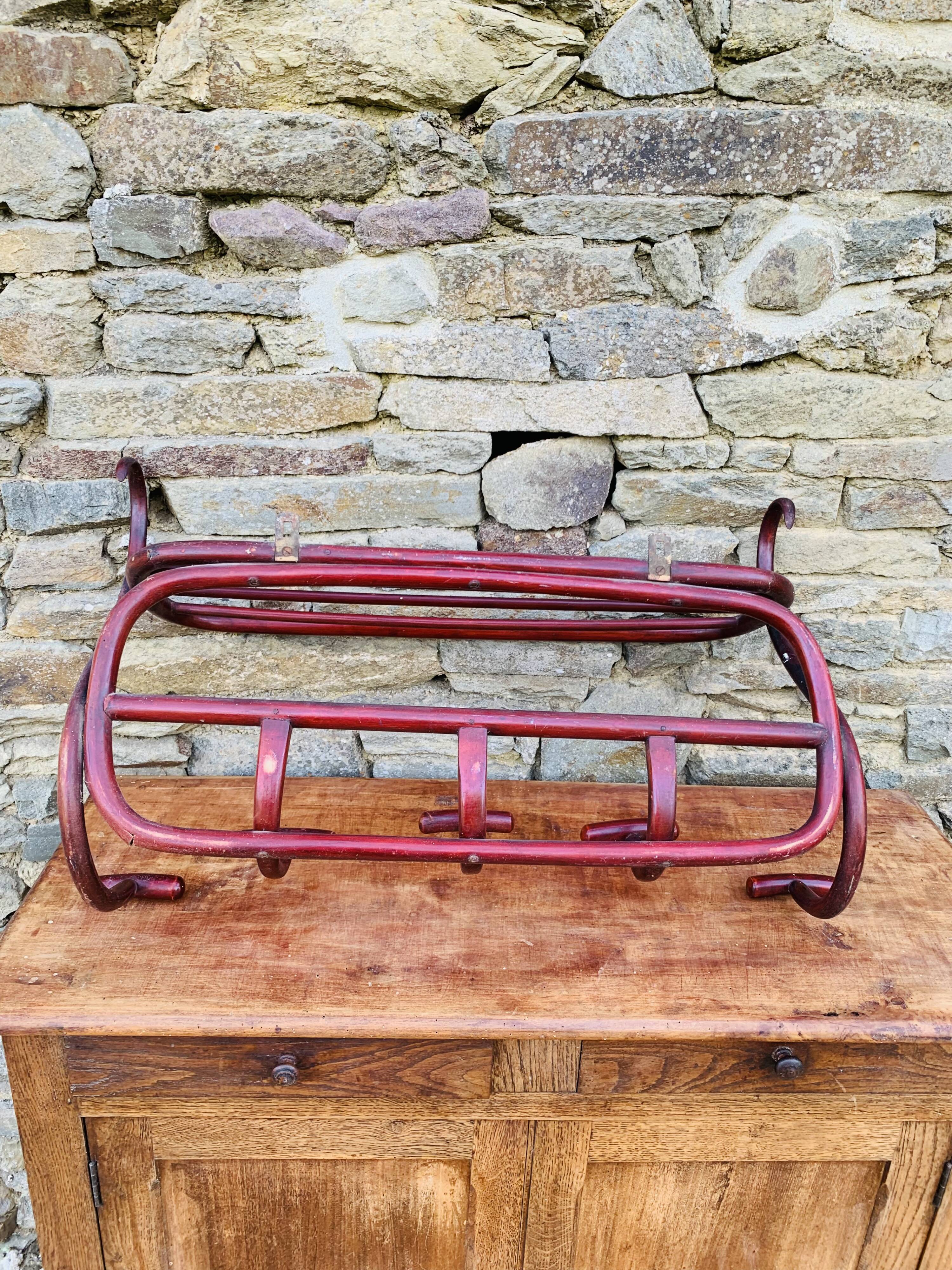 Antique curved wooden wall coat rack
