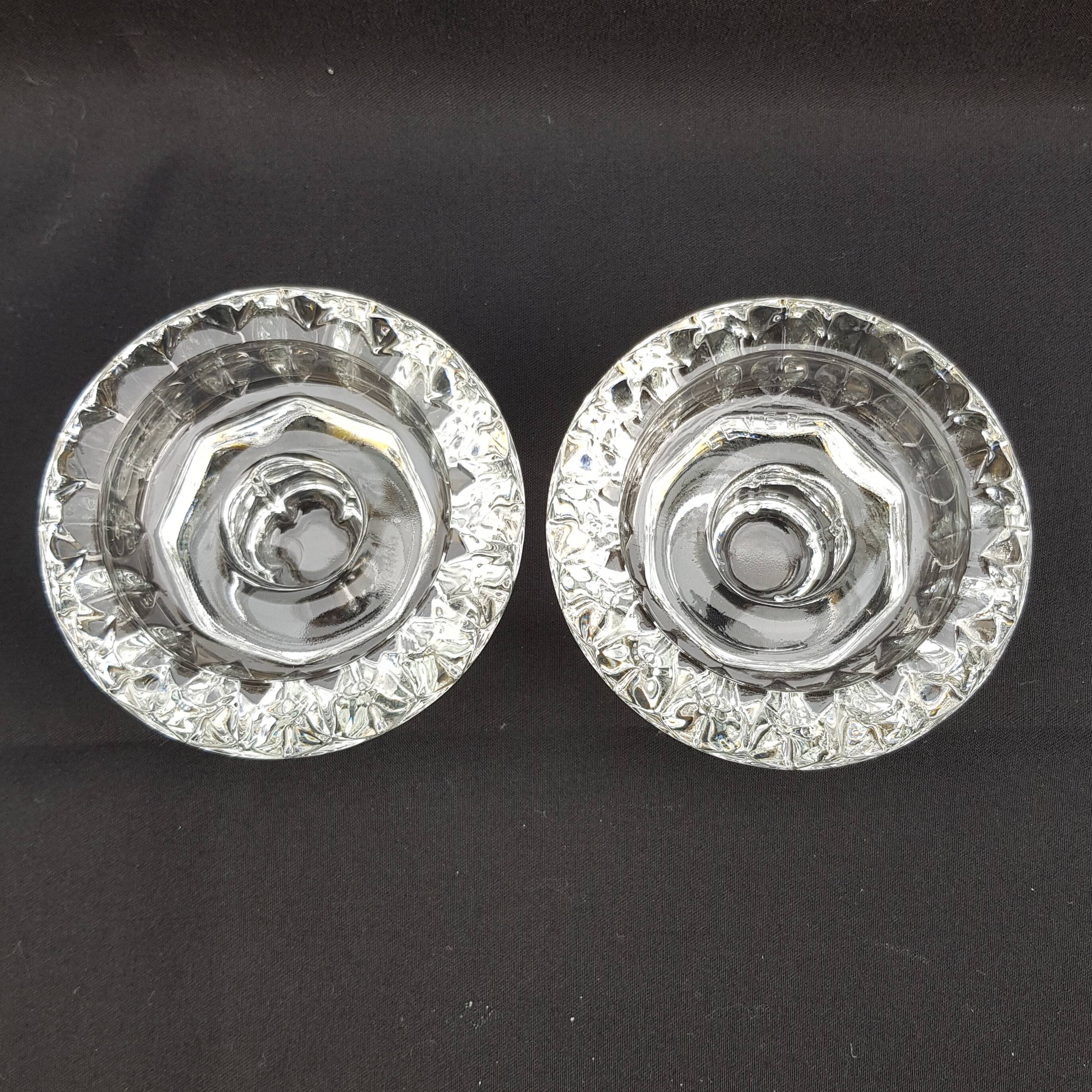 Duo of old glass candlesticks