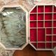 Old hanging showcase 22 wooden boxes red background
