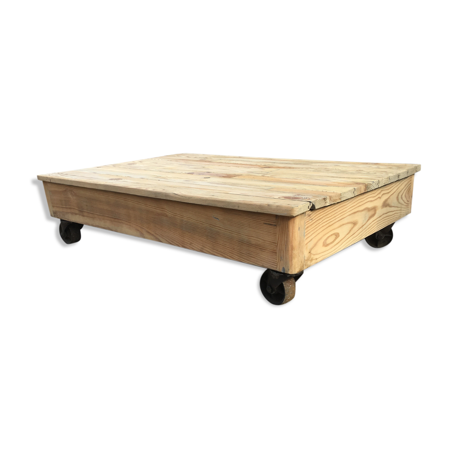 Old wooden school platform bass table on metal wheels