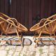 Pair of rattan armchairs Audoux-Minnet style