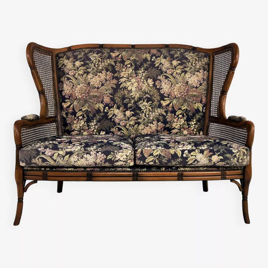 Wingback 2-seater sofa in carved wood, cane and fabric