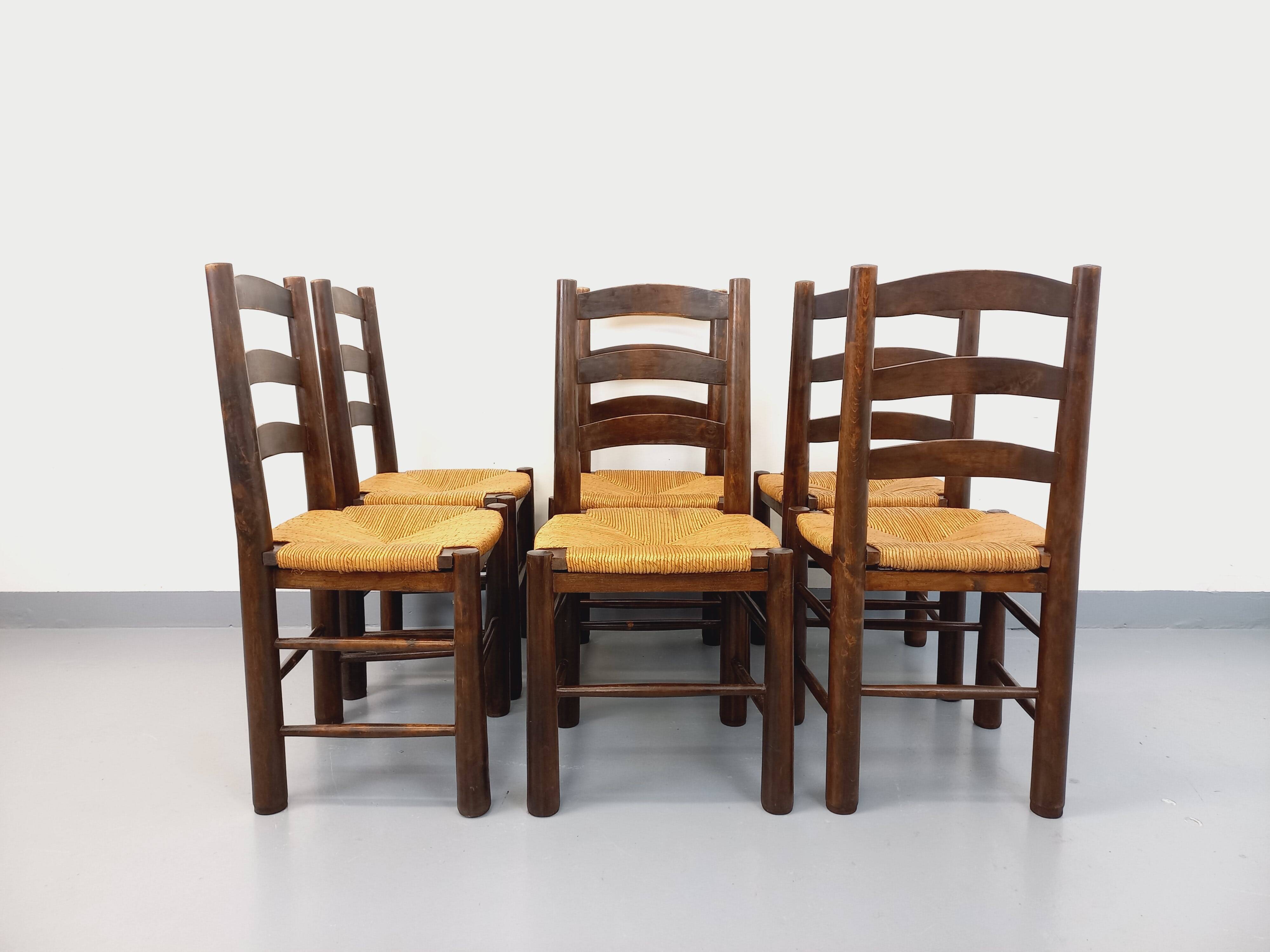 Set of 6 vintage brutalist chairs by Georges Robert in straw wood from the 1960s.