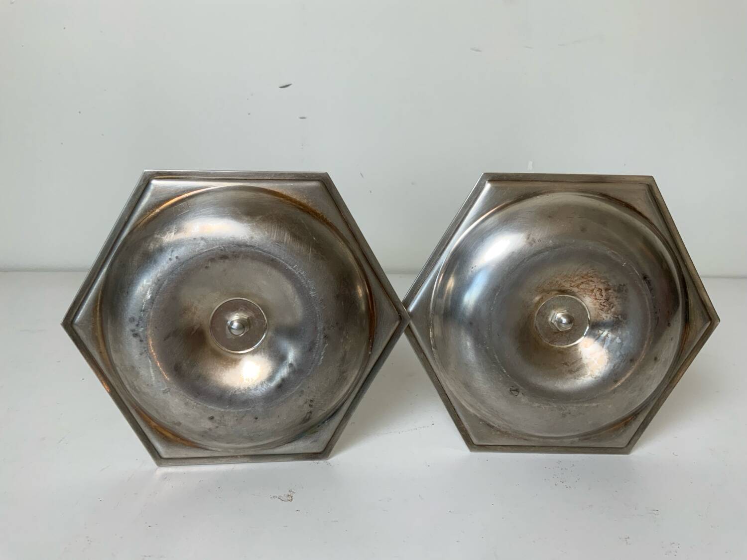 Pair of silver-plated metal candlesticks