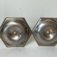 Pair of silver-plated metal candlesticks