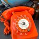 Orange vintage dial phone