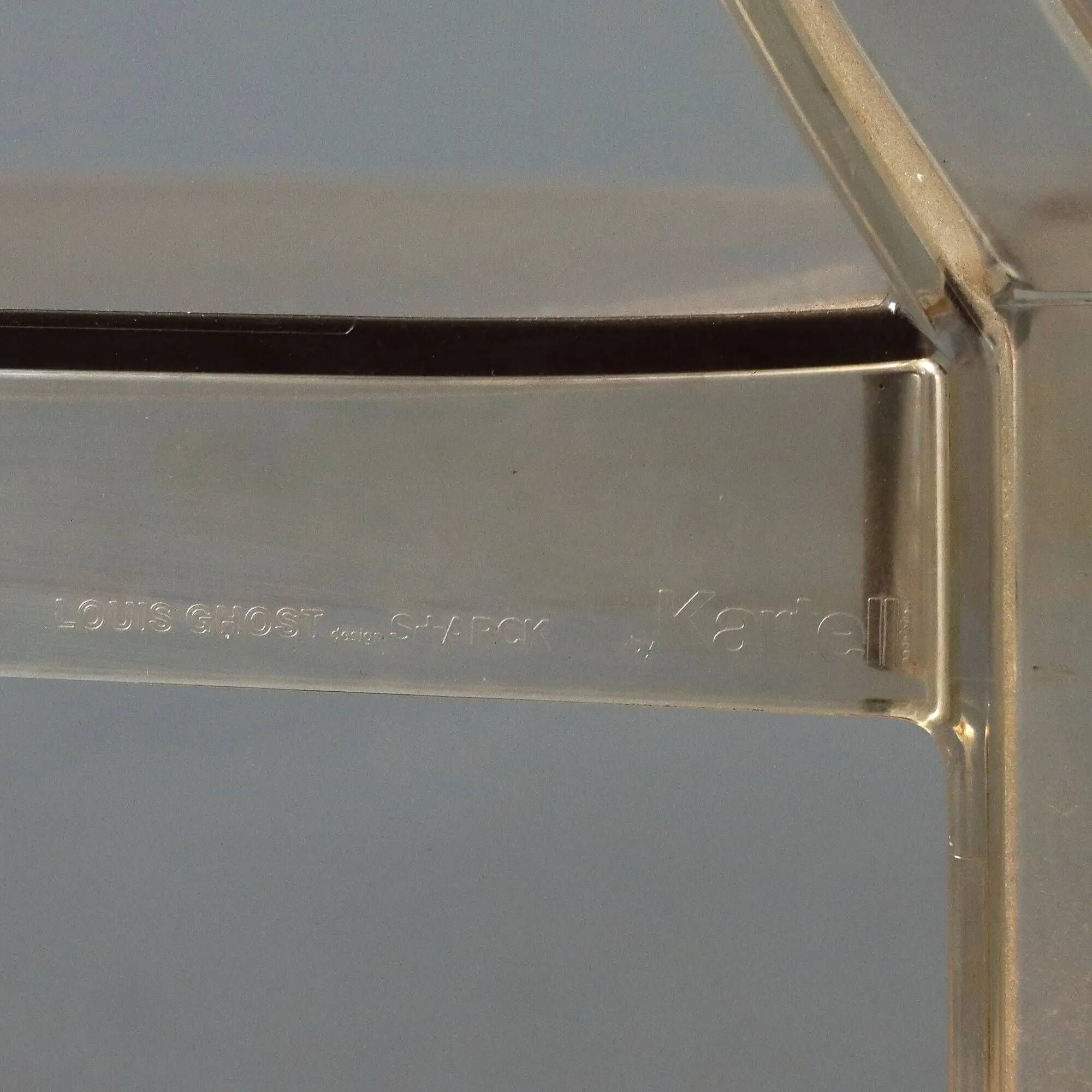 Louis Ghost chairs by Kartell designed by Philippe Starck from the 2000s.