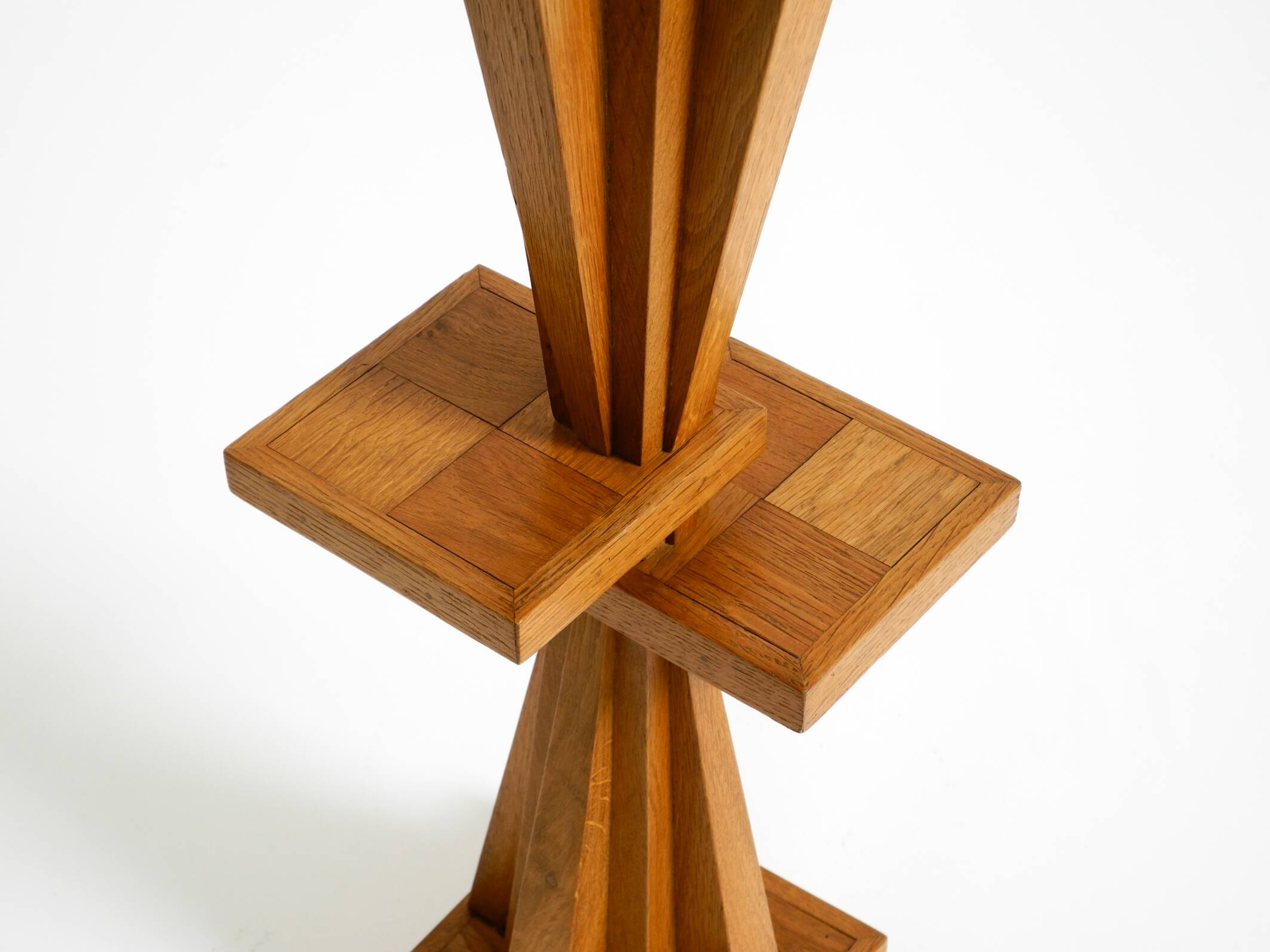 Two mid-century standing ashtrays consisting of red Alabaster cup