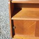 Vintage accent furniture in golden blonde oak with 2 sliding doors.