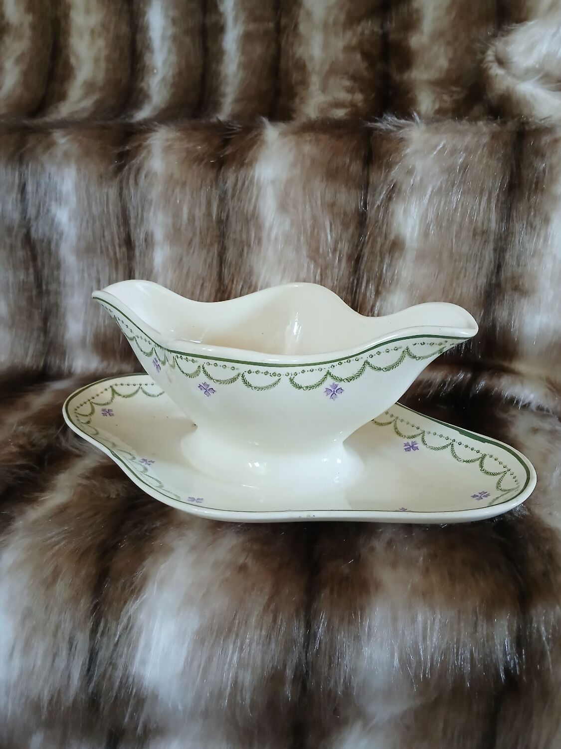 Antique sauce boat in Longwy ironstone.