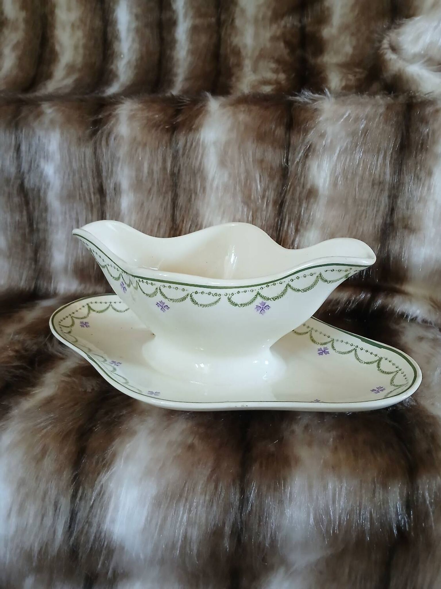 Antique sauce boat in Longwy ironstone.