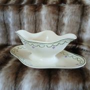 Antique sauce boat in Longwy ironstone.