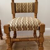 Pair of wooden chairs with herringbone fabric