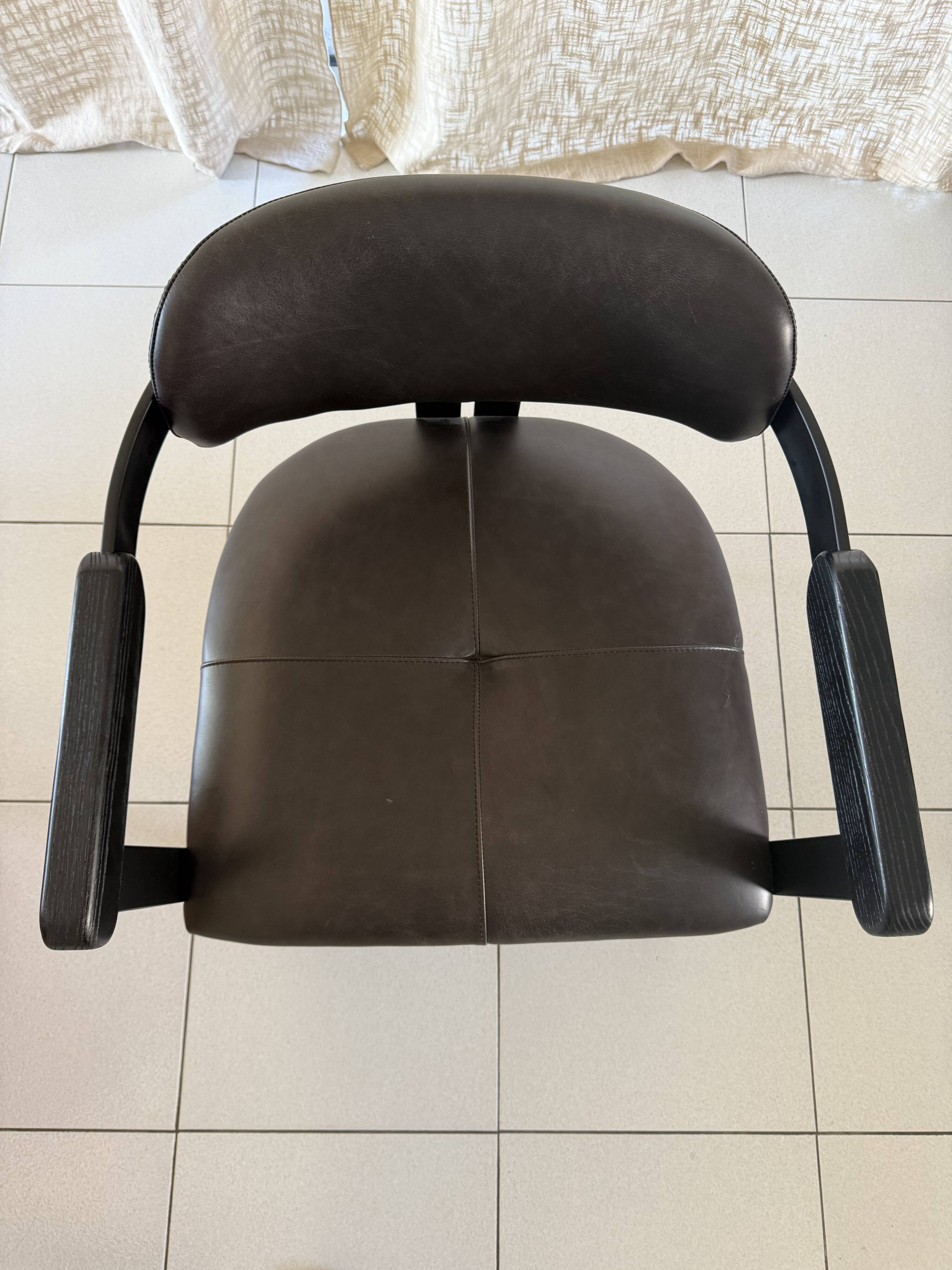 Set of 2 black leather and metal armchairs