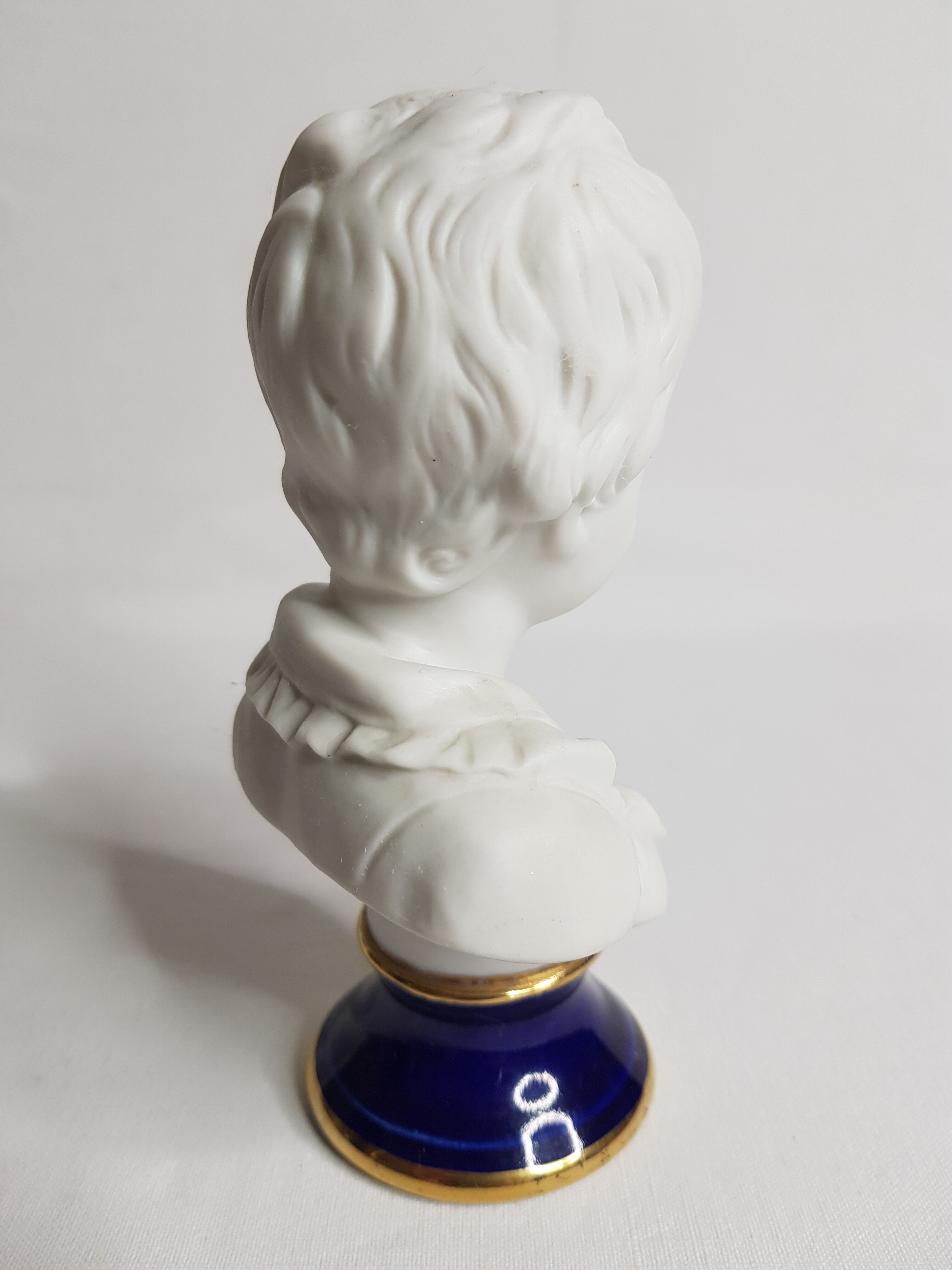 Porcelain biscuit bust, child, Alexandre Brongniart after Houdon