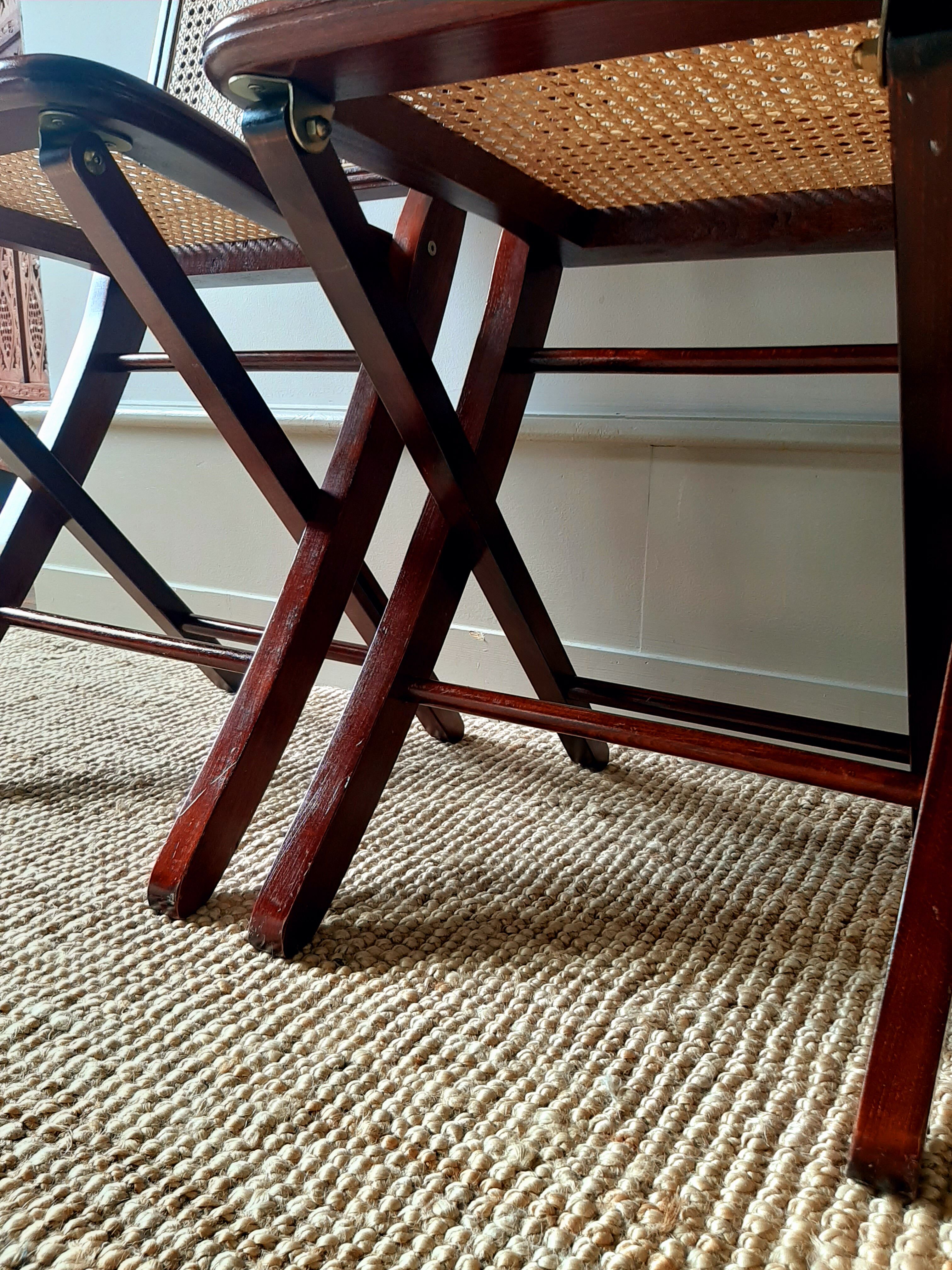 Folding wooden chairs and cannage