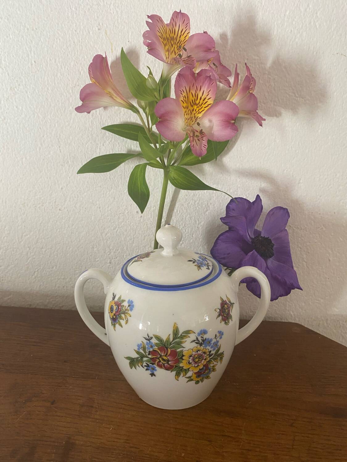 Large sugar bowl with floral porcelain.
