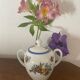 Large sugar bowl with floral porcelain.
