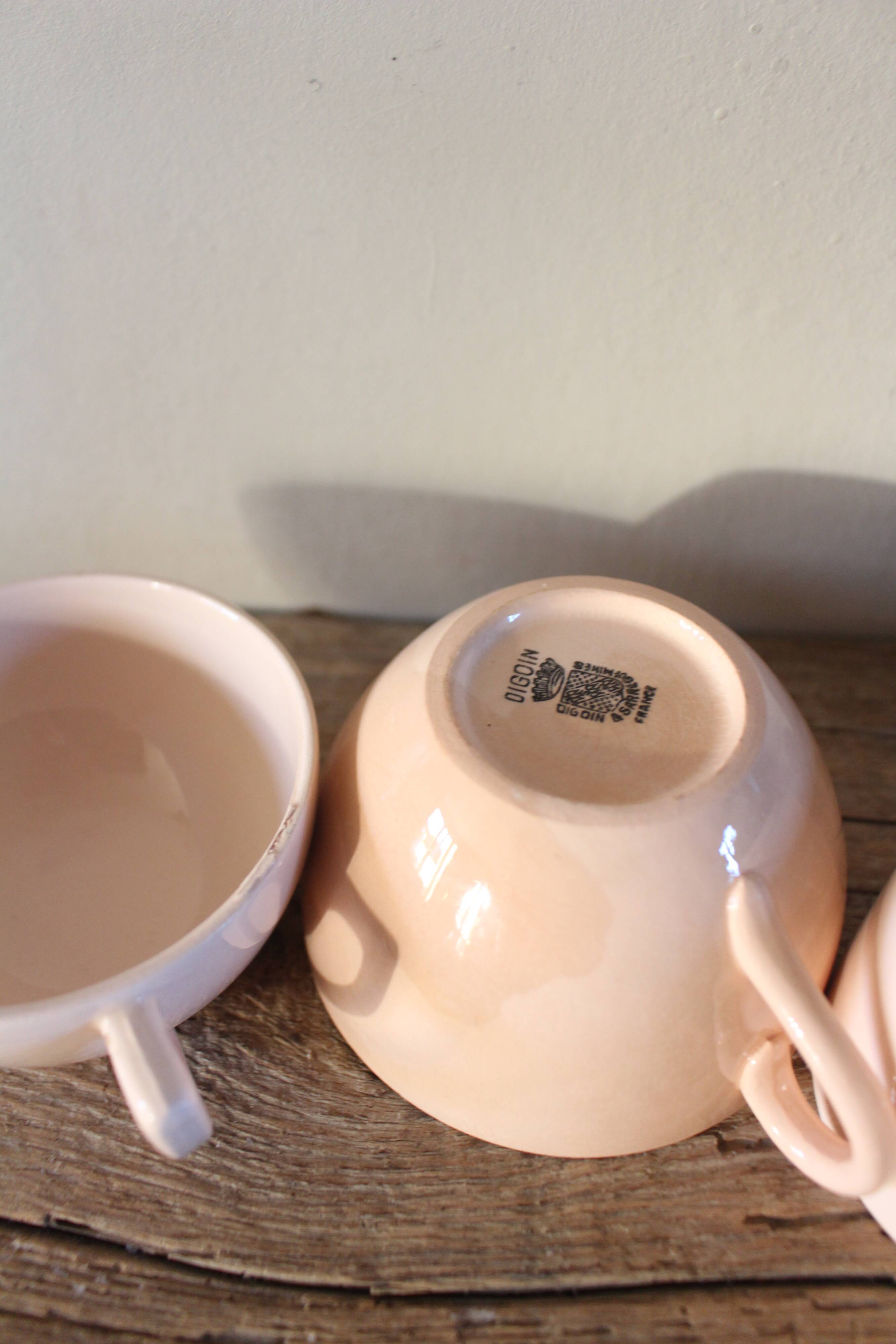 A set of 3 pink earthenware cups from Digoin Sarreguemines.