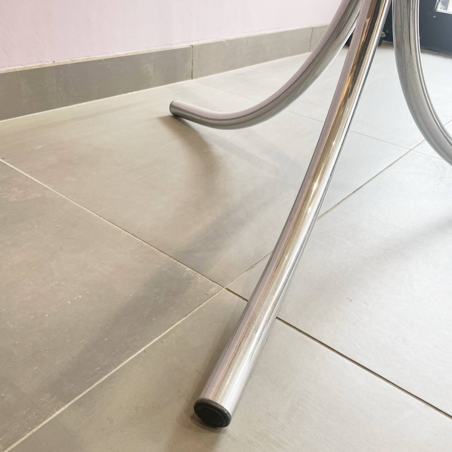 Chromed metal and smoked glass table