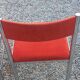 Pair of designer chairs in chrome metal and orange velvet from the 1970s.